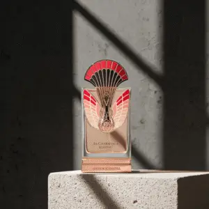 perfume botlle of La Charmante Eclatant Maison Alhambra on a plan stone